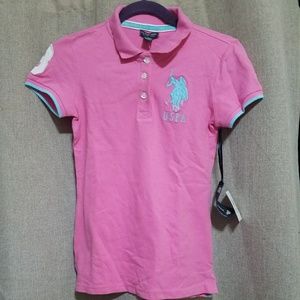 A pink and blue USPA shirt